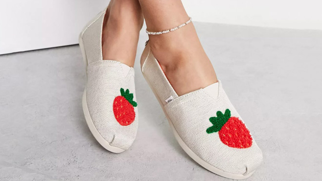 a Woman Wearing TOMS Alpargata Strawberry Shoes