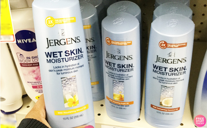 an Image of a Hand Holding a 10 Ounce Bottle of Jergens Wet Skin Moisturizer an Image of a Hand Holding a 10 Ounce Bottle of Jergens Wet Skin Moisturizer