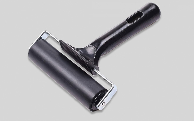 4 Inch Rubber Brayer Roller for Printmaking on a Gray Background