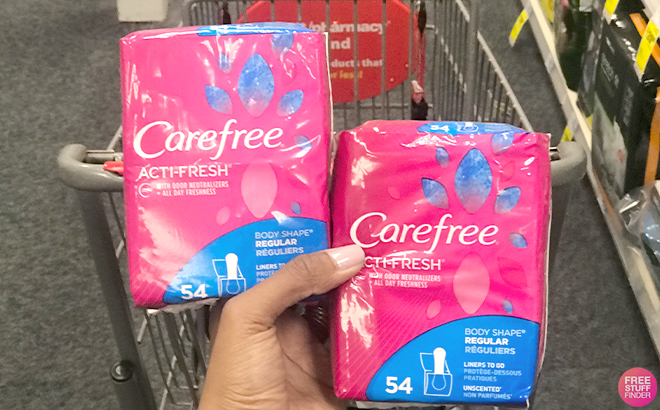 A Hand Holding a 2 Carefree Acti Fresh Panty Liners 54 ct
