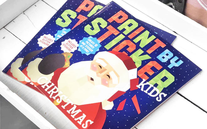 A Person holding a Paint by Sticker Kids Christmas 1