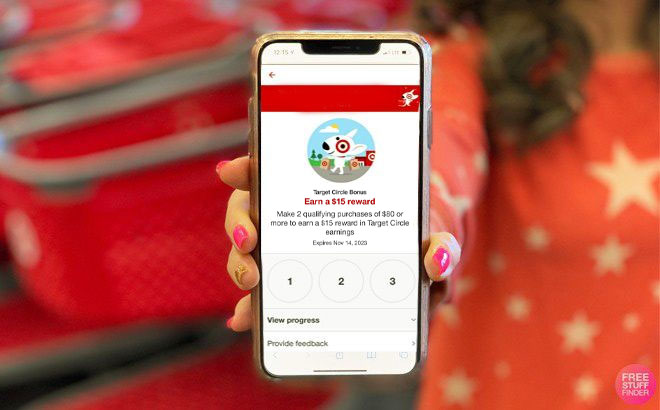 A Woman Holding a Mobile Phone with Target 15 Circle Bonus Offer on the Screen