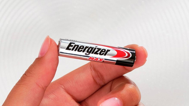 A hand holding an AA Energizer Max Battery