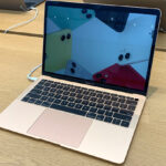 Apple13 Inch MacBook Air in Gold Color on a Table