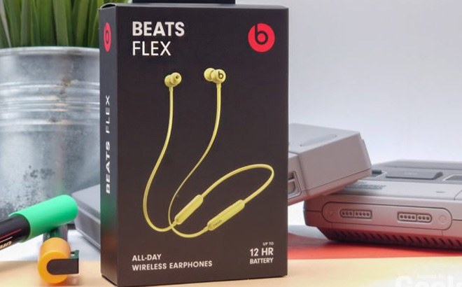 Beats Flex Wireless Earbuds in Yuzu Yellow Color on the Table