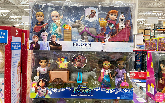 Disney Princess Frozen and Encanto Petite Deluxe Doll Sets on a Shelf at Costco