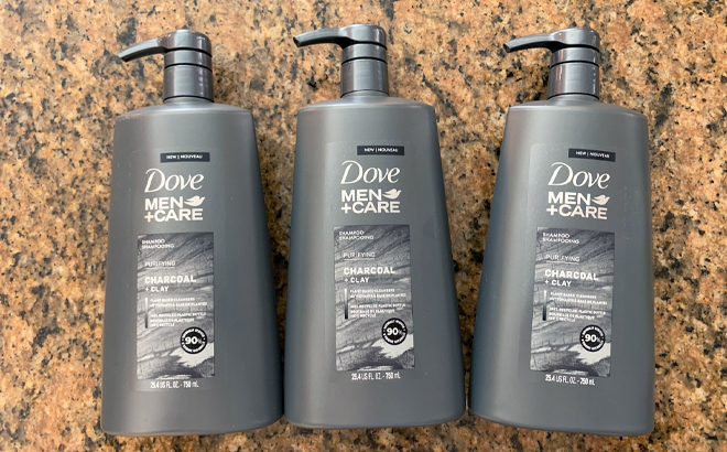 Dove MenCare Shampoo 3 Count on a Counter
