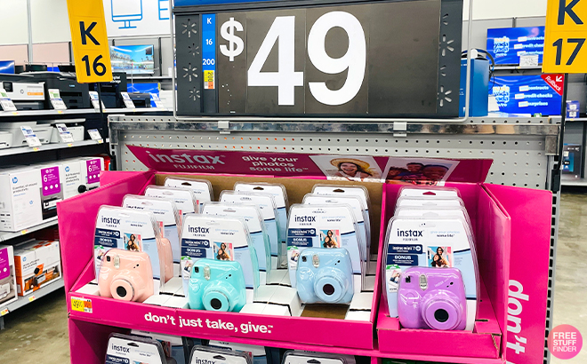 Fujifilm Instax Mini 7+ Exclusive Blister Bundles in Various Colors on a Shelf