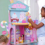 Girls Playing With the KidKraft Candy Castle Wooden Dollhouse