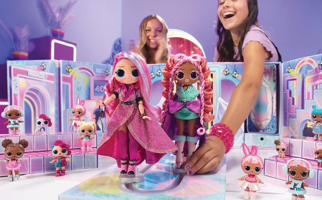 Girls Playing with L O L Surprise Fashion Show Mega Runway Playset