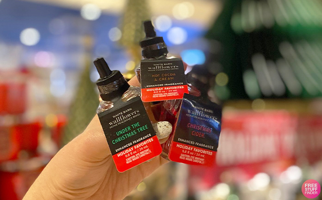 Hand Holding Bath Body Works Wallflowers Fragrance Refills
