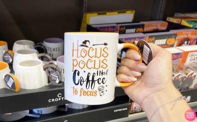Hand Holding Crofton Hocus Pocus Coffee Mug