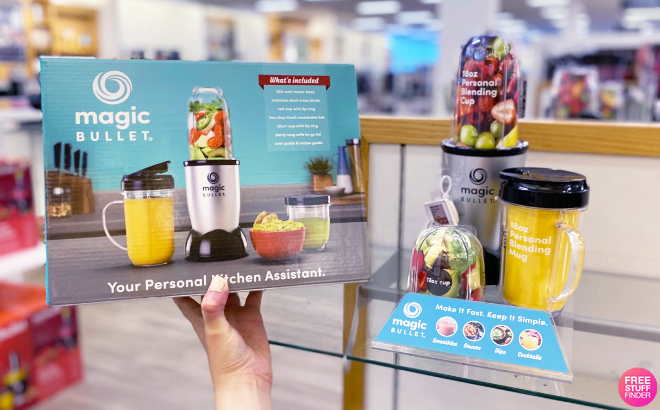 Hand Holding Magic Bullet Single Serve Blender in a Box and Shown on the Shelf