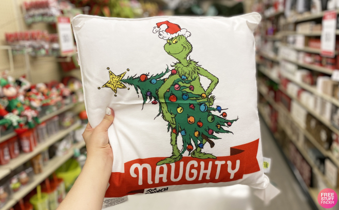 Hand Holding The Grinch Max Christmas Pillow