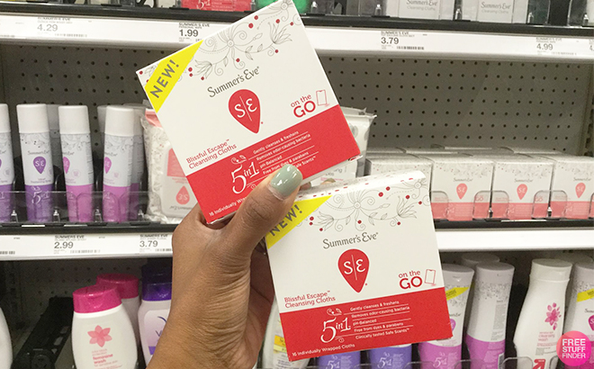 Hand Holding Two Summers Eve Blissful Escape Feminine Cleansing Wipes at Target