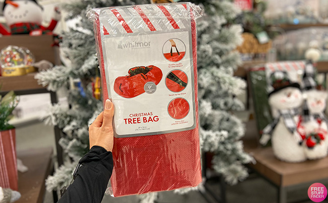 Hand Holding Whitmor Christmas Tree Bag