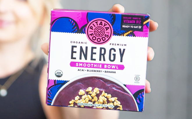 Hand Holding a Pitaya Foods Frozen Energy Smoothie Bowl