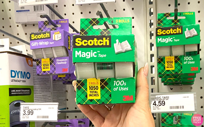 Hand Holding a Scotch Magic Tapes 3 Pack