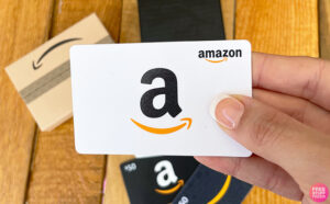 Hand Holding an Amazon Gift Card