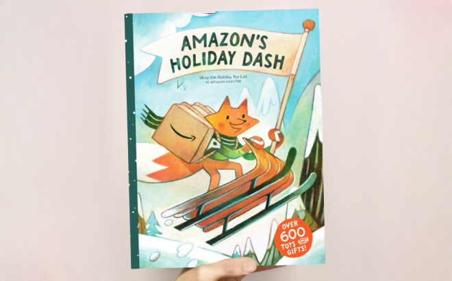Hand Holding an Amazons Holiday Dash Kids Gift Book
