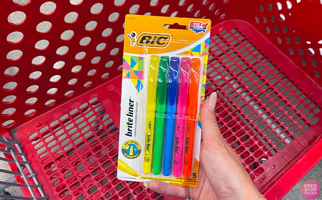 A Hand Holding BIC Brite Liner Assorted Highlighters with the Target Cart in the Background