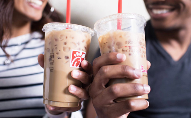 Hands Holding Chick fil A Iced Coffees