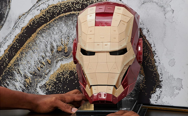 Hands Touching a Built Marvel Iron Man 3D Model
