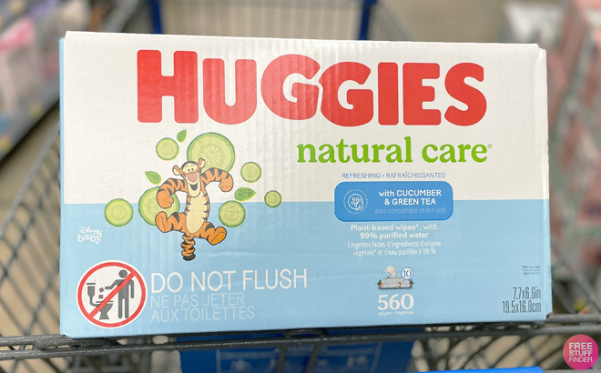 Huggies Natural Care Refreshing Baby Wipes 560 Counts on a shopping cart