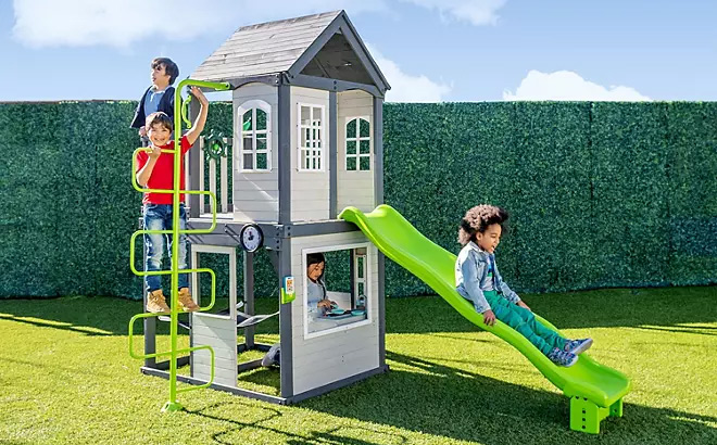Kids are Playing with Sportspower 2 Story Wooden Playhouse