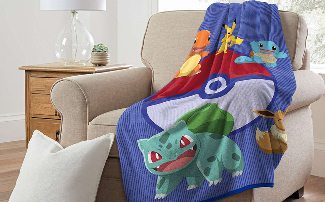Licensed Character Pokemon Friendly Wave Silk Touch Throw Blanket on the Chair