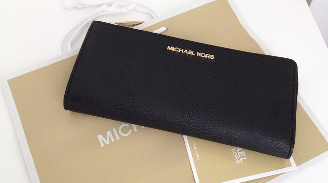 Michael Kors Jet Set Travel Large Saffiano Leather Quarter Zip Wallet in Black