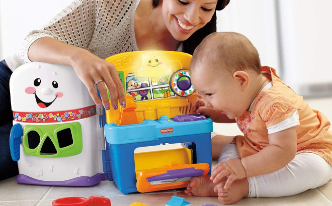 Mom and Baby Playing with Fisher Price Laugh Learn Playset