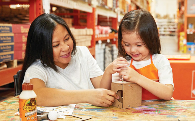 Mom and Daughter in Home Depot Workshop