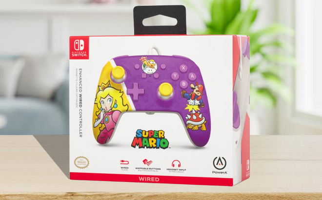 Nintendo Switch Wired Controller Princess Peach Battle Box on a Table