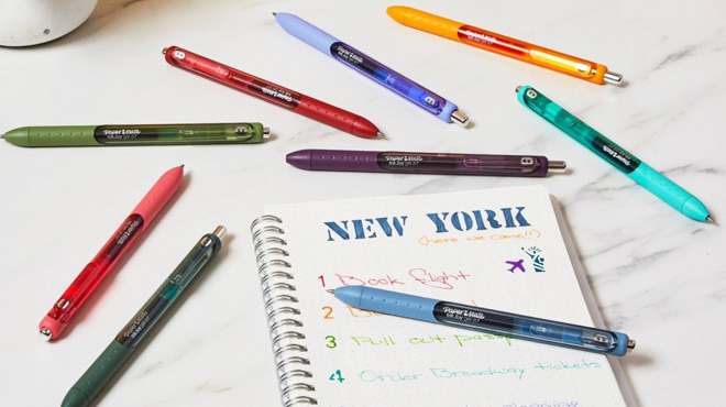 Paper Mate Inkjoy Gel Pens on a Table and Notebook