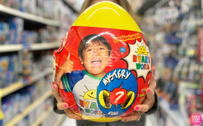 Person Holding Ryans World Giant Mystery Egg Series 8 at Walmart