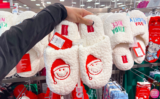 Person Holding Wondershop Christmas Slippers Santas Happy Face at Target