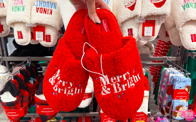 Person Holding Wondershop Merry and Bright Christmas Slippers at Target