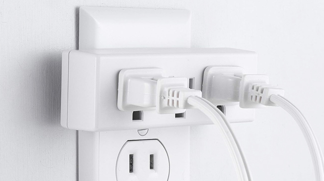 Philips 3 Outlet Extender with Wires on the Wall