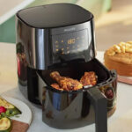 Philips 3000 Series 4 1 Liter Air Fryer with Food on a Table