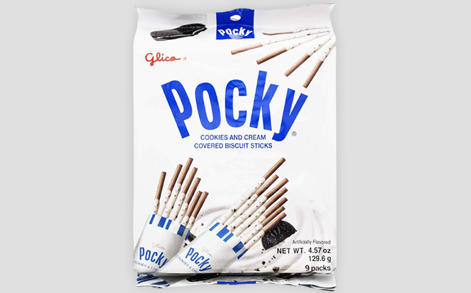 Pocky Cookies and Cream Covered Biscuit Sticks on a Light Gray Background