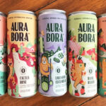 Six Cans of Aura Bora Sparkling Water
