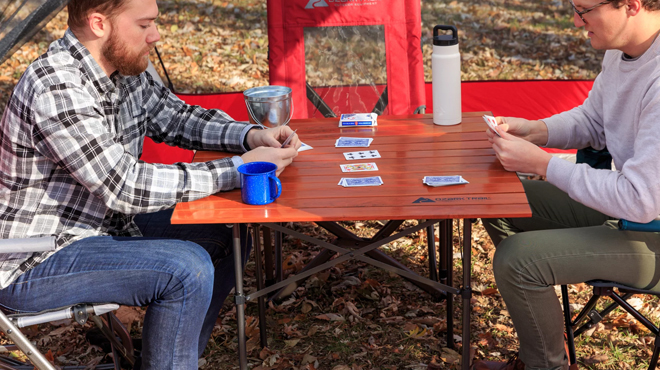 Two Men Playing Cards on Ozark Folding Table