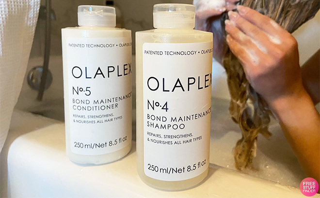 Two Olaplex Hair Care Products on the Side of the Bathtub