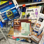 Walmart Cart with Vacuums and a Coffee Maker