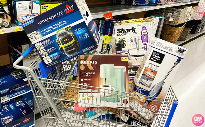 Walmart Cart with Vacuums and a Coffee Maker