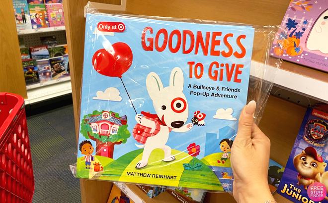 Woman Holding a Goodness to Give Target Bullseye Pop up Board Book