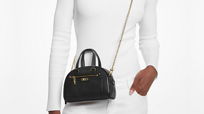 Woman Wearing Michael Kors Williamsburg Extra Small Pebbled Leather Crossbody Bag