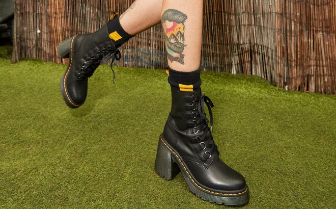 Woman is Wearing Dr Martens Chesney Boots in Black Color