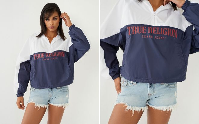 Woman is Wearing True Religion Half Zip Logo Windbreaker in Navy Sapphire Color